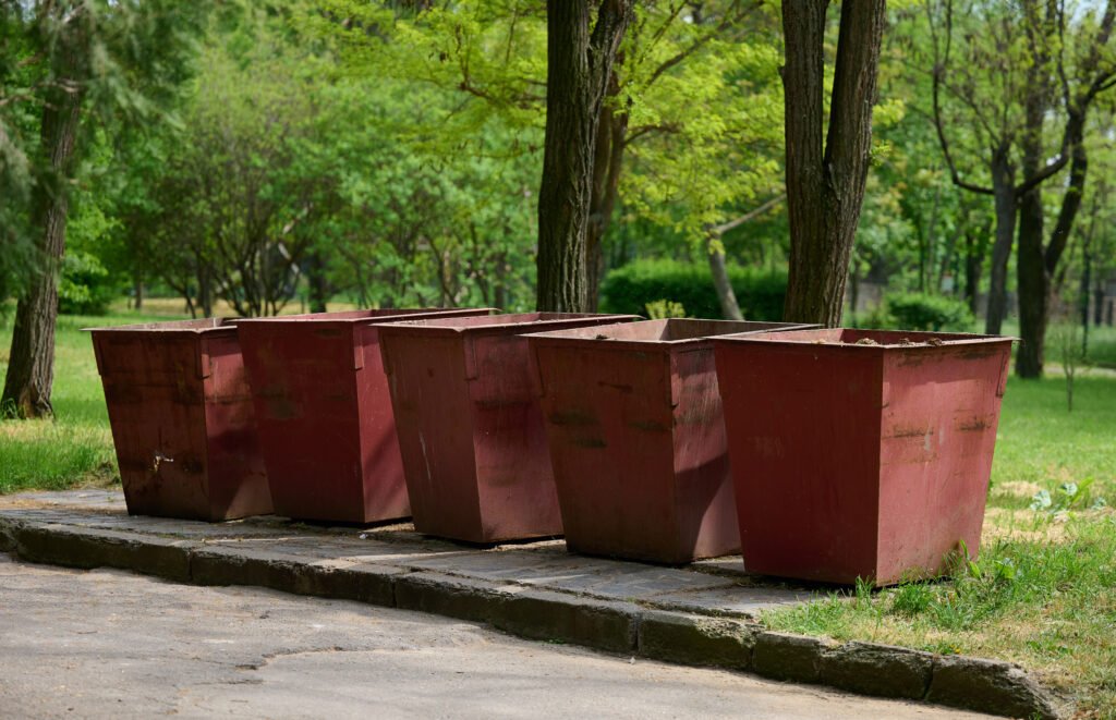 Empty metal trash cans